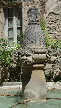 S&eacute;guret, Vaucluse, Provence-Alpes-C&ocirc;te d'Azur, France. July 04, 2026. Historic village fountain monument from the 17th century. Clean drinking water, fresh water access. Sustainable water resources.