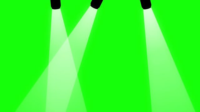 Three bright spotlight beams on green screen background crossing spotlights