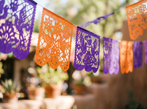 Bright Colorful Papel Picado Paper Flags Hanging Outdoors under Sunlight