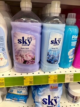 01.08.2026 Ukraine, Kharkov Liquid Fabric Softener Bottles Displayed on Supermarket Shelf