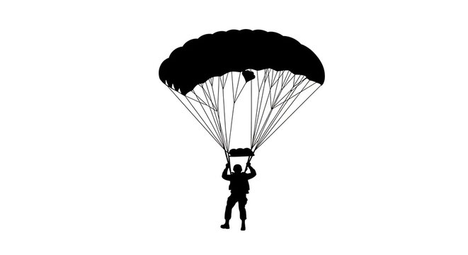 Silhouette of a paratrooper descending with a parachute