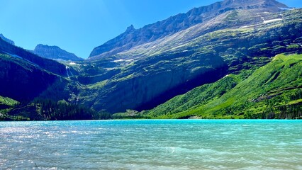 A peaceful mountain scene in Glacier National Park, Montana, capturing the raw beauty and timeless landscapes of the American wilderness. © Fern
