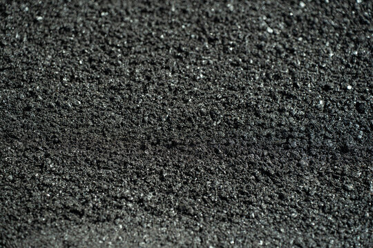 Fresh Black Asphalt Paving Texture in Full Frame