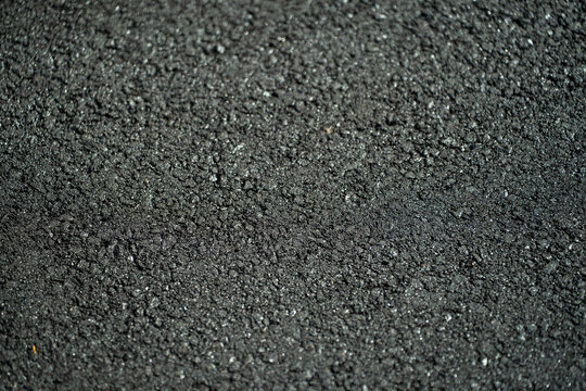 Close-Up of Fresh Black Asphalt Road Surface Texture