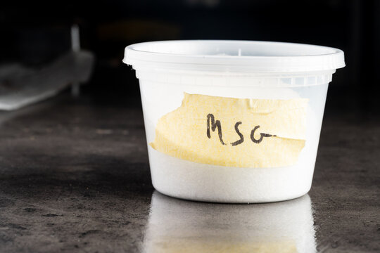 container of MSG labeled hand written on masking tape