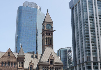 Fototapeta premium Edward James Lennox's Old City Hall with clocktower viewed from Nathan Phillips Square - incl view of Cadillac Fairview Tower, 20 Queen St W), Toronto