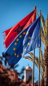 moroccan flag waving next to european union flag