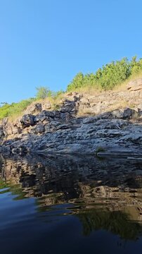 Busky Canyon in summer, Cherkasy region, Ukraine. A cozy corner of wild nature in Ukraine with massive granite boulders and summer trees. Busky Granite Canyon, picturesque river Hirsky Tikich