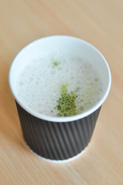 green tea or matcha green tea, milk green tea or matcha latte or matcha green tea latte in the paper glass