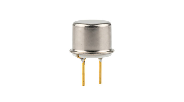 Small cylindrical electronic component with a metallic casing and two gold pins, isolated on a white background, macro studio shot