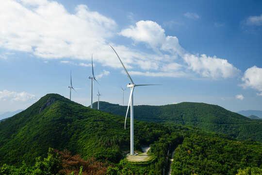 Wind Turbines on Forested Mountain Ridge