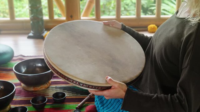 Wonan's Hands playing on ocean drum in the gazebo. Healing medicine and meditation
