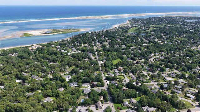 The Atlantic Ocean washes against the beautiful coast of Chatham on Cape Cod, Massachusetts. This outer Cape is a popular and scenic east coast vacation destination during summer months.