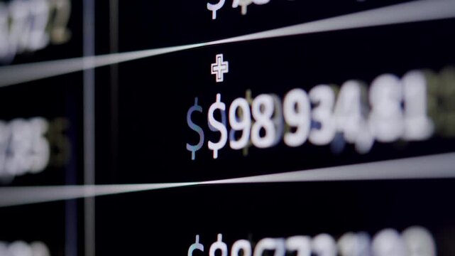 Finance Data Cash Flow and Stock Market Analysis on PC Screen Close Up with Annual Tax Report