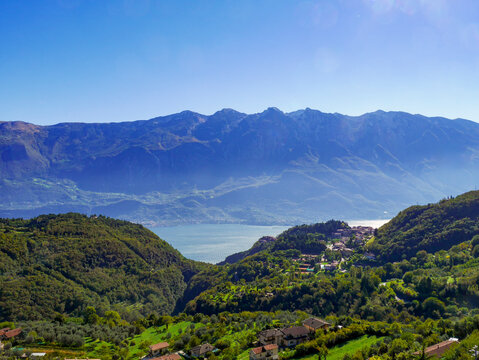 View from Sompriezzo of Pieve and the valley through which the famous Strada della Forra runs. Lake Garda and Monte Baldo are visible in the background.