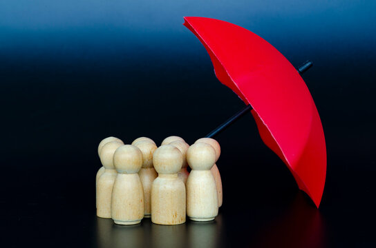 Leadership and insurance concept showing umbrella protection over followers with trust and security.
