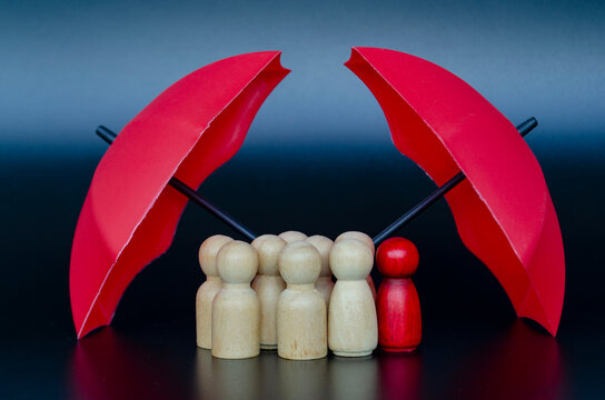 Group of followers receiving umbrella protection representing effective leadership, trust, and risk prevention.
