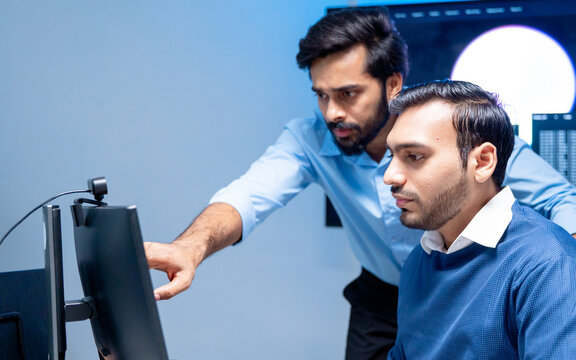 Team engineers software developers are brainstorming and using computer writing code to develop AI technology. Programmer using laptop work system about artificial intelligence and cyber security 