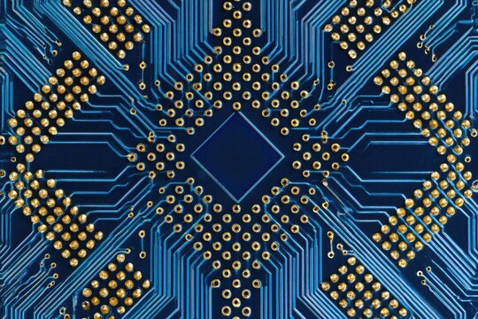 Intricate blue circuit board with golden connection points in a symmetrical pattern
