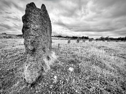 Black And White Ancient Standing Stone In Field
