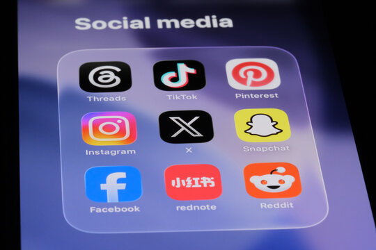 Shanghai,China-July 30th 2026: social media apps on smartphone screen showing icons of threads, tiktok, pinterest, instagram, x twitter, snapchat, facebook, rednote, reddit