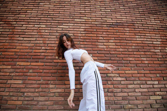 Flexible girl bending over backwards