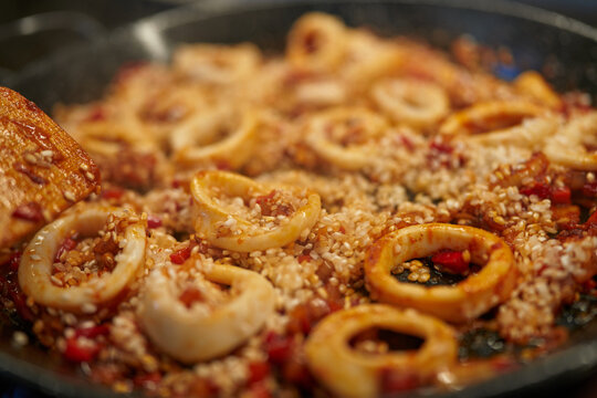 Cooking Traditional Seafood Paella with Clams