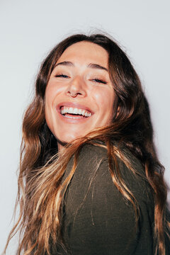 Joyful woman smiling with confidence