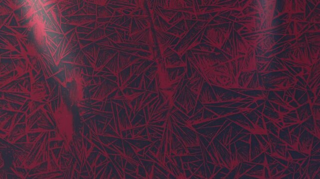  Abstract background pattern of red geometric shards with dark textures.