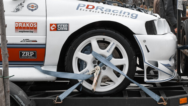 corfu, corfu, Greece. February 16, 2025: Race car secured on a trailer