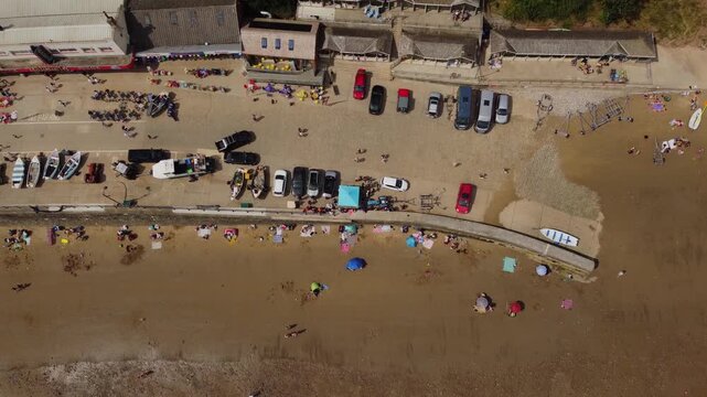 Birds eye view. Drone. 50FPS. Filey, English seaside town. Summer holidays. UK