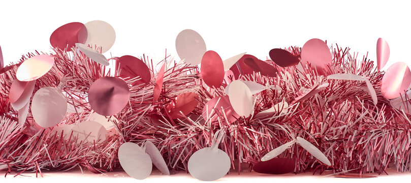 pink tinsel garland with round confetti isolated white background, shiny metallic festive decoration with large sequins, side view