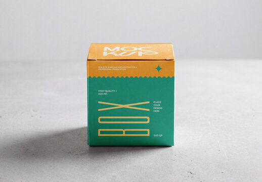 Gold and Green Cube Box Mockup on Concrete Surface