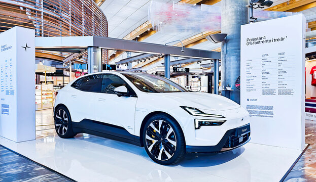 NORWAY, OSLO, JULY 4, 2026: A show display featuring a white electric car the Polestar 4, a coupe-crossover with a panoramic glass roofis on display at Oslo Airport. The model is manufactured in China