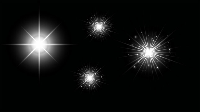 Bright starburst light flares on black background. High-contrast glowing lens flare effects for graphic design and digital art.