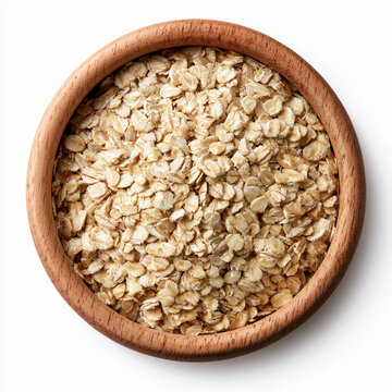 Top view of raw rolled oats in a wooden bowl isolated on white background