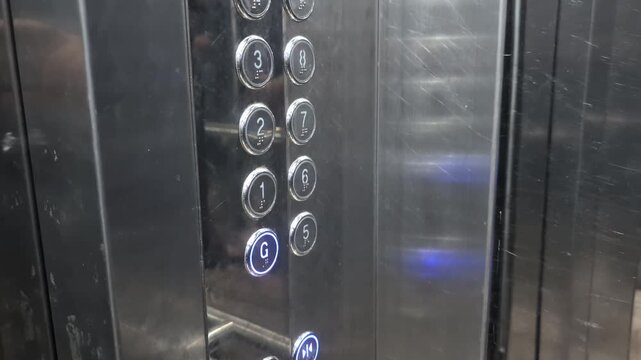 Elevator buttons pressed in a building in Bangladesh