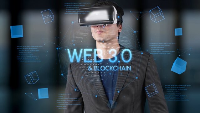 Young man wearing virtual reality headset exploring concepts of Web 3.0 and blockchain technology with futuristic interface background. Entropy.