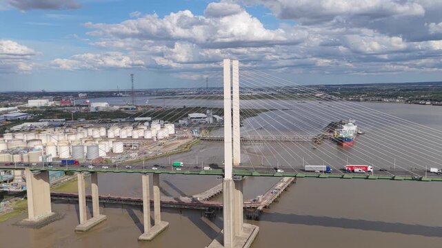 Queen Elizabeth II Bridge Crossing the River Thames During a Bright Sunny Afternoon