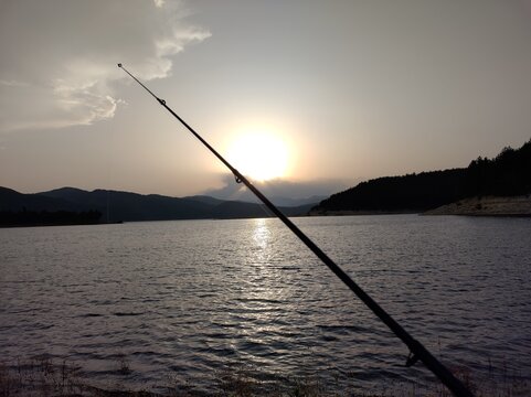 fishing at sunset