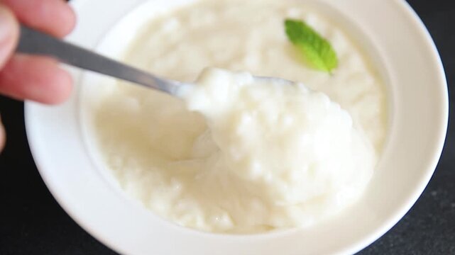 Sweet rice porridge healthy breakfast, vanilla dessert food preparation tasty snack fresh and delicious gourmet food background on the table rustic food top view copy space