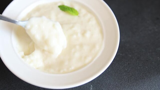 Sweet rice porridge healthy breakfast, vanilla dessert food preparation tasty snack fresh and delicious gourmet food background on the table rustic food top view copy space