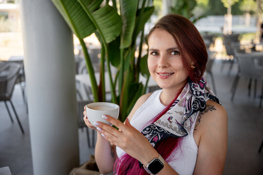 Freelancer enjoying a stylish coffee break at cafe