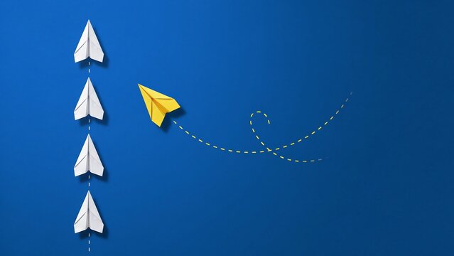 Yellow paper plane leading white ones. Concept of leadership and business innovation.