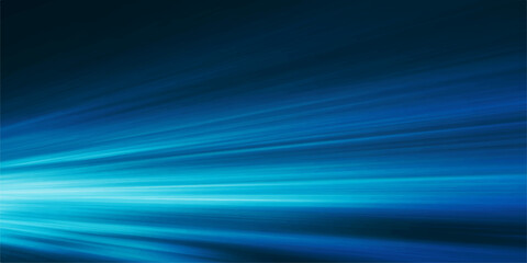 Obraz premium Abstract blue light trails streaking across a dark background, suggesting speed and technology.