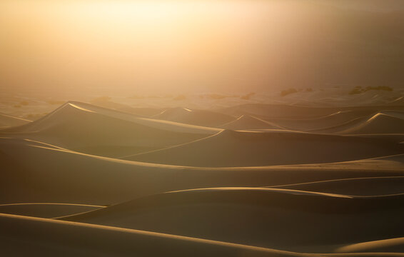 Sunrise haze over Mesquite Flat sand dunes, Death Valley