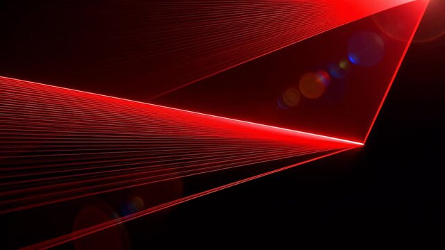 Red laser beams on black background
