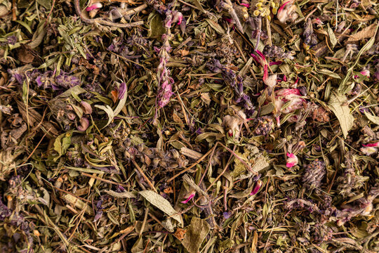 Dried herbal tea blend with leaves and flower petals