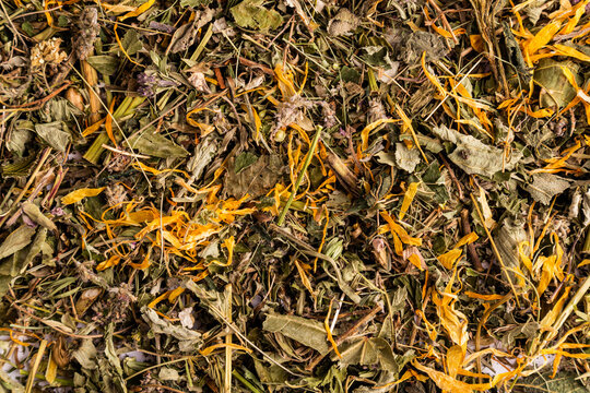 Dried herbal tea blend texture with petals and leaves