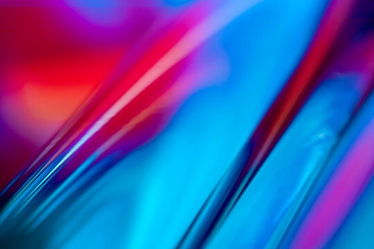 Abstract blue and magenta light streak background